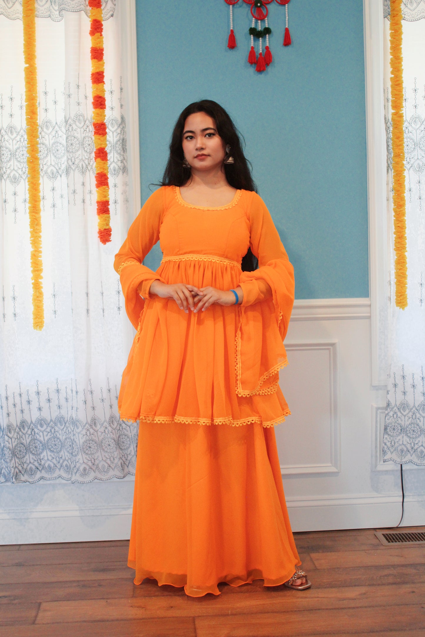 Yellow Anarkali Kurta Set with Sharara Pant.