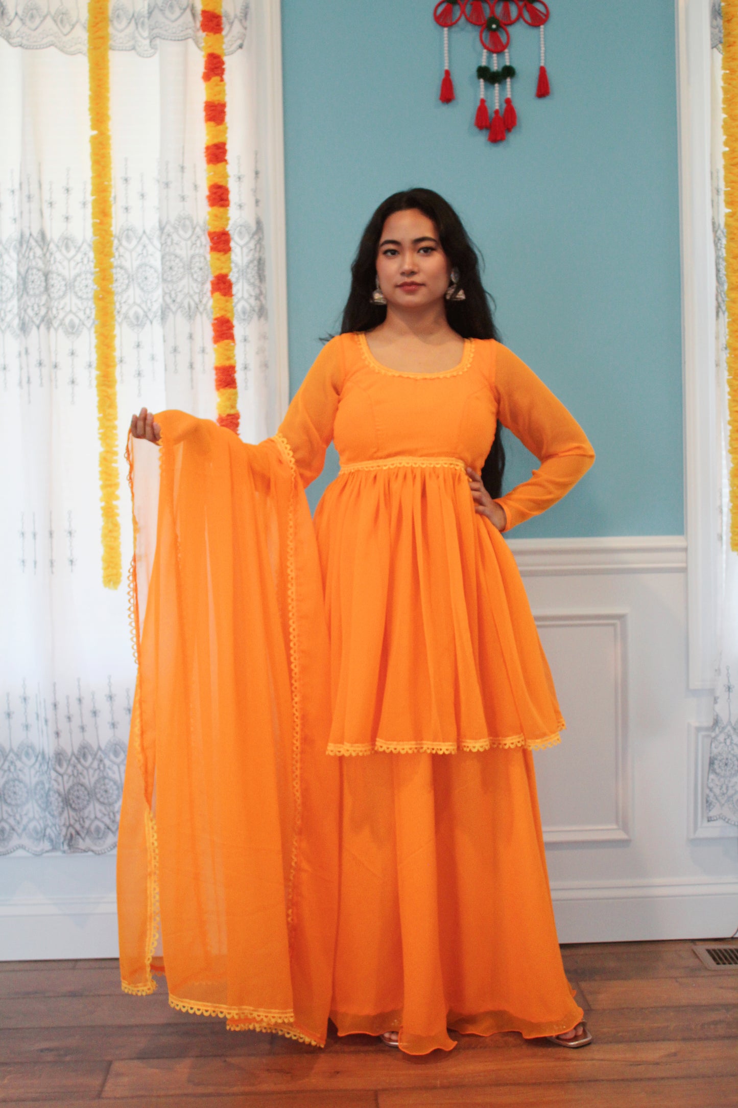 Yellow Anarkali Kurta Set with Sharara Pant.