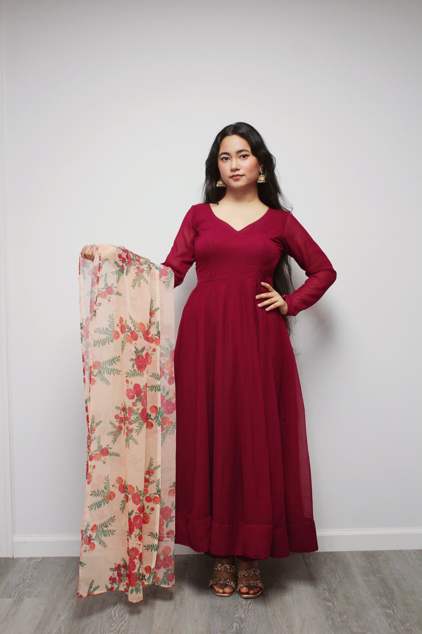Maroon Anarkali set with contrasting dupatta.