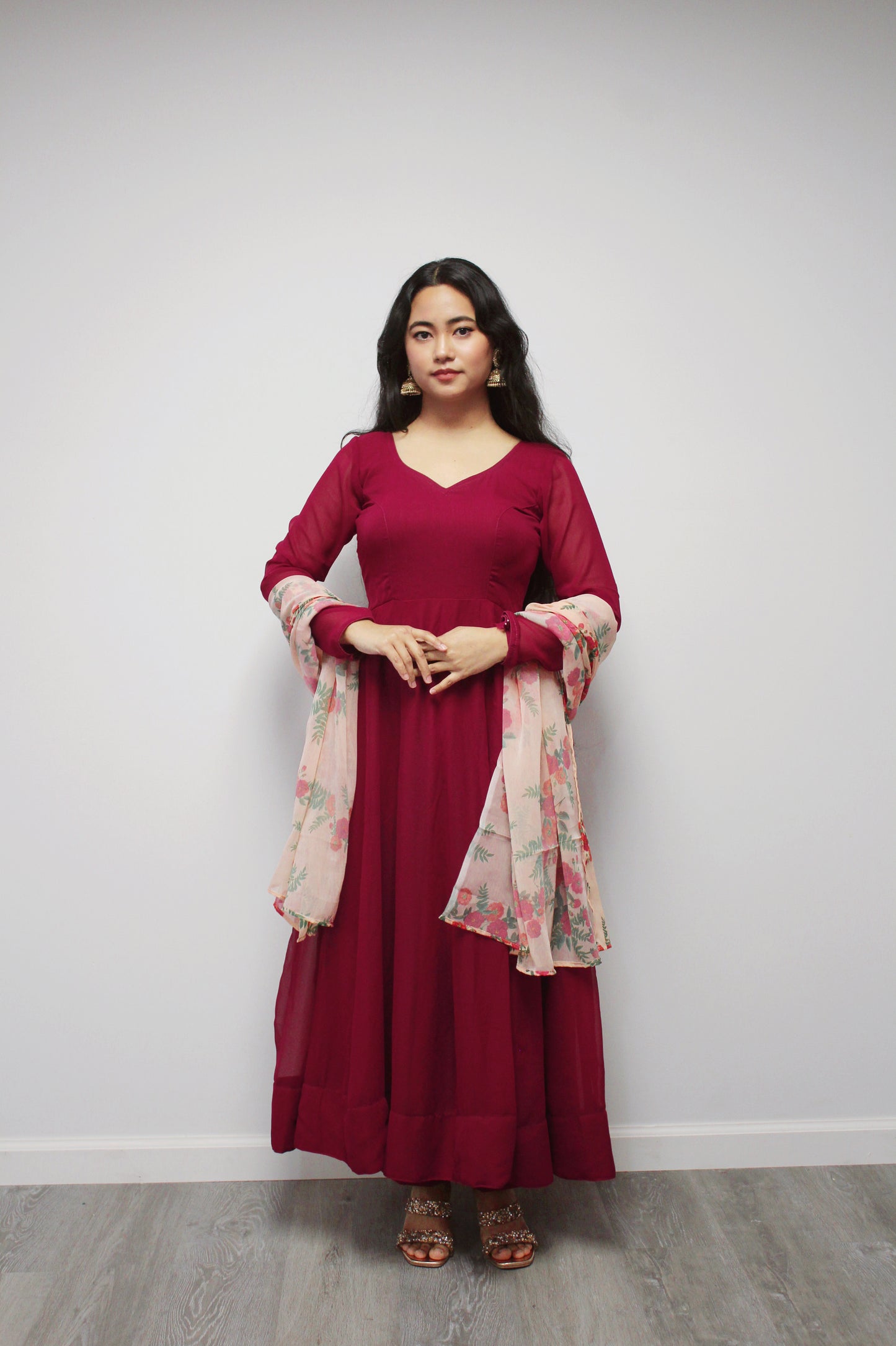 Maroon Anarkali set with contrasting dupatta.