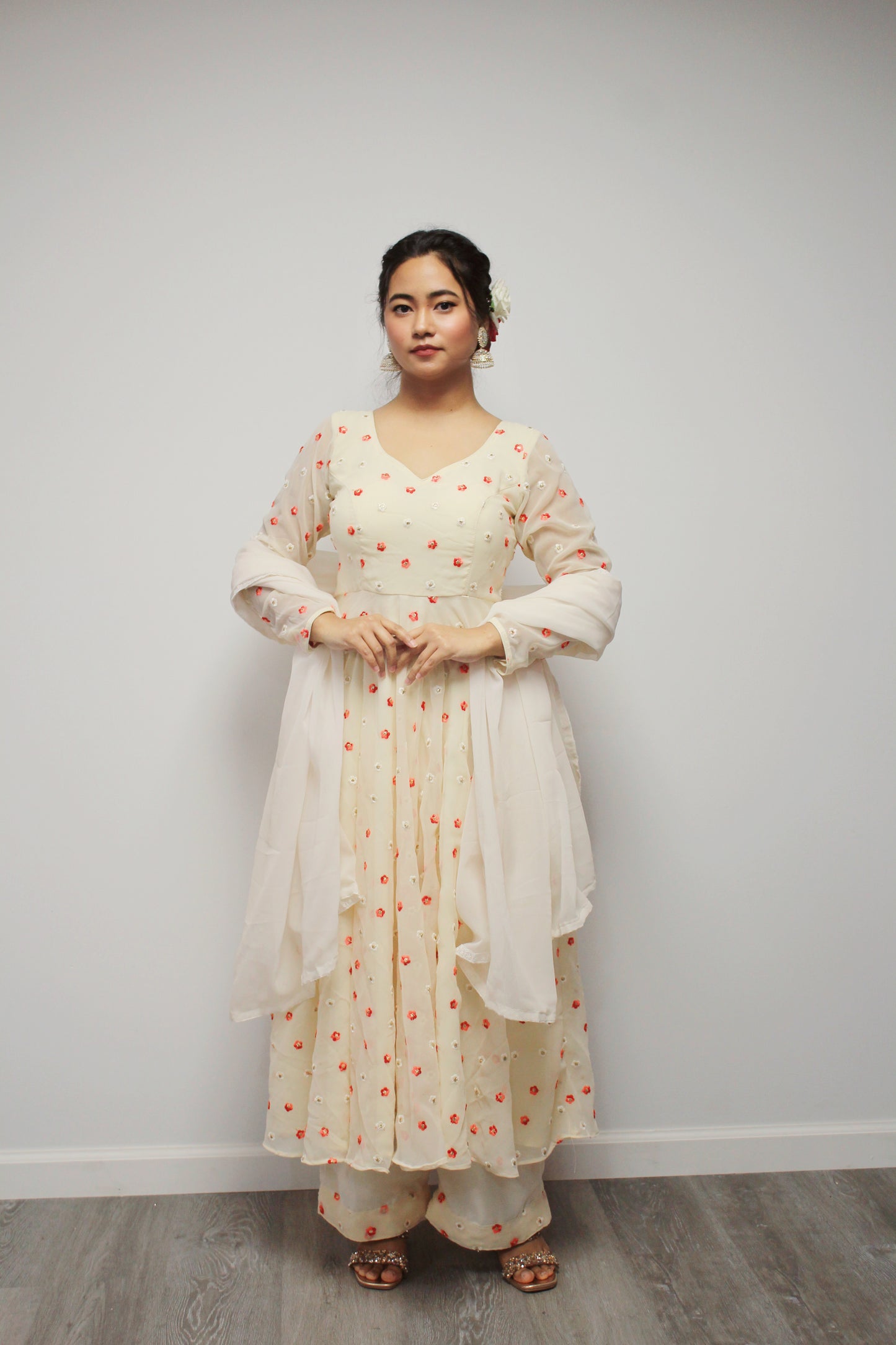 Flower Embroidered Cream Anarkali set with palazzo pant.
