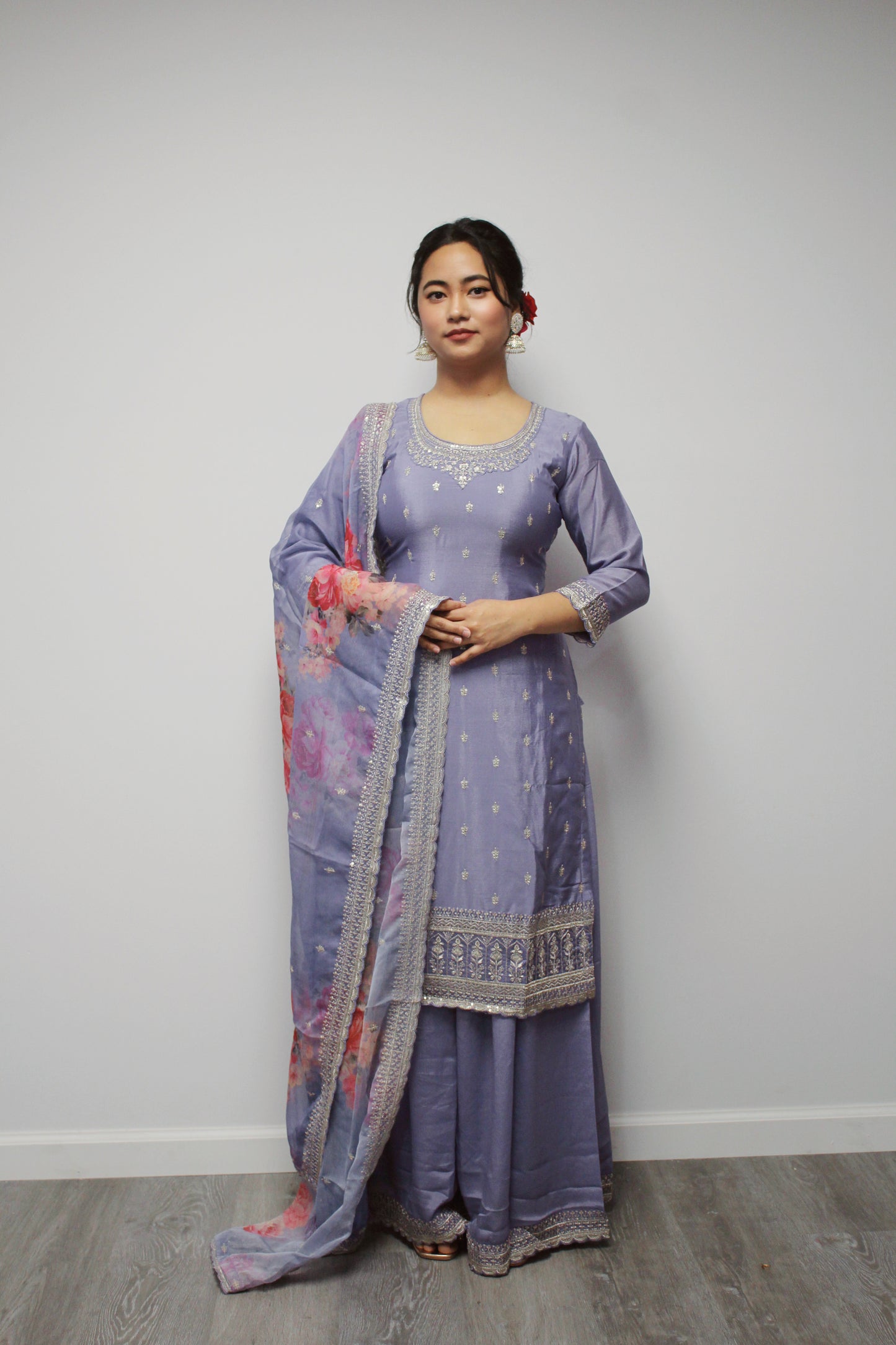 Lavender Sharara set with floral dupatta.