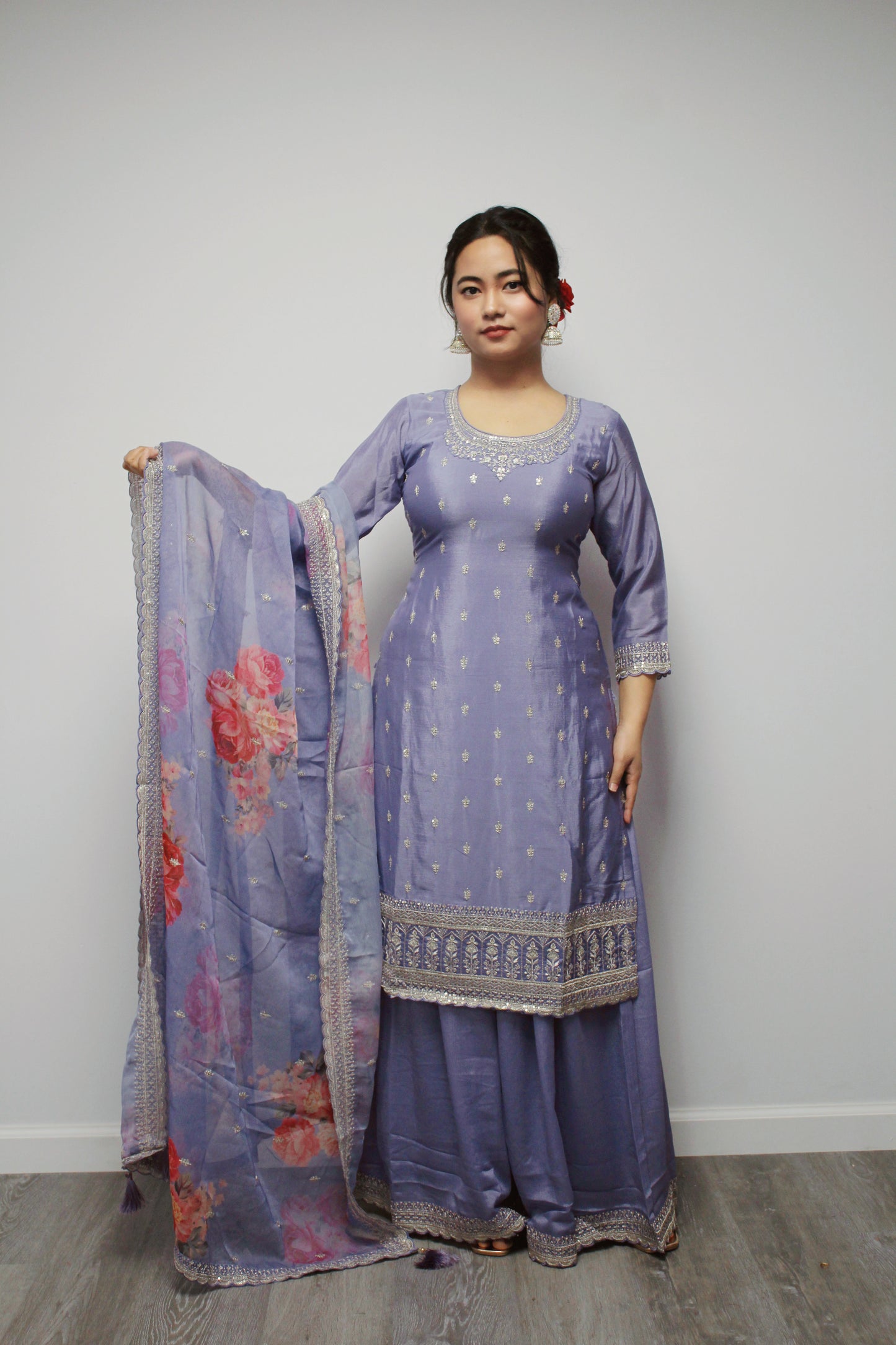 Lavender Sharara set with floral dupatta.
