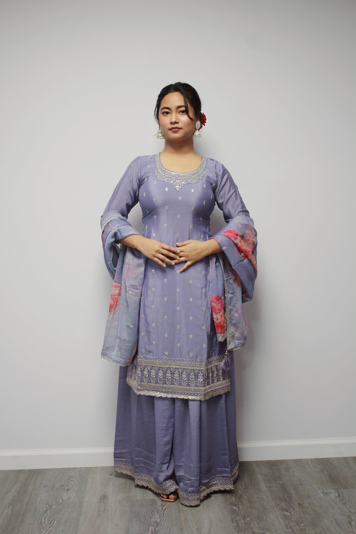 Lavender Sharara set with floral dupatta.
