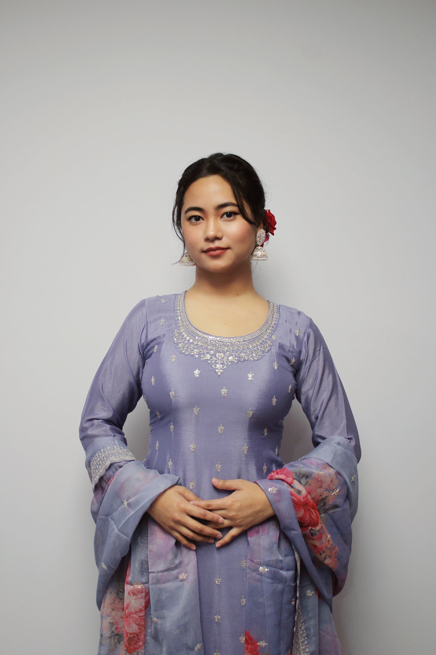Lavender Sharara set with floral dupatta.