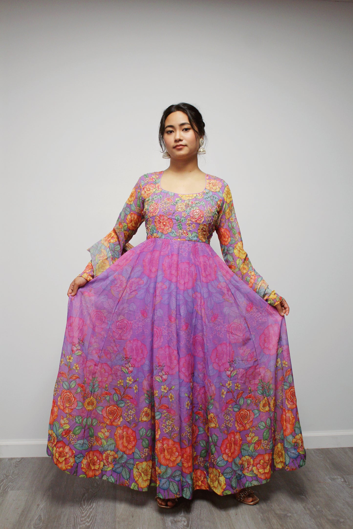 Floral Hand-worked Gown with pant and dupatta.