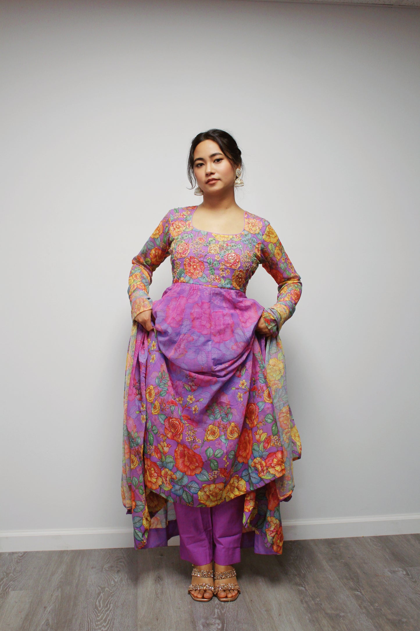 Floral Hand-worked Gown with pant and dupatta.