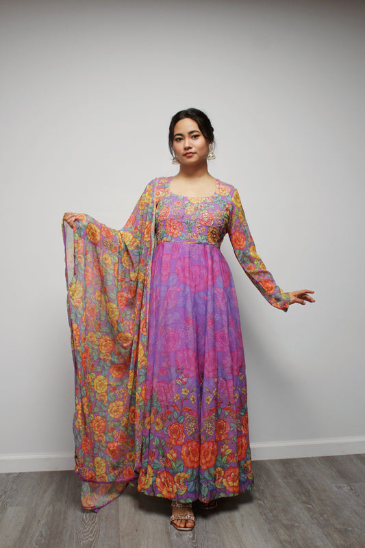 Floral Hand-worked Gown with pant and dupatta.