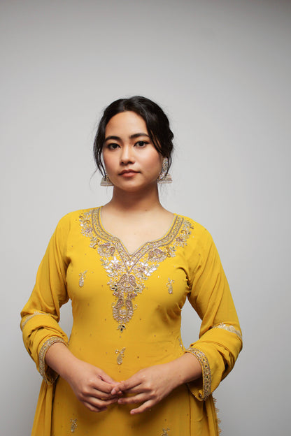 Hand-worked Palazzo Kurta set with Dupatta.