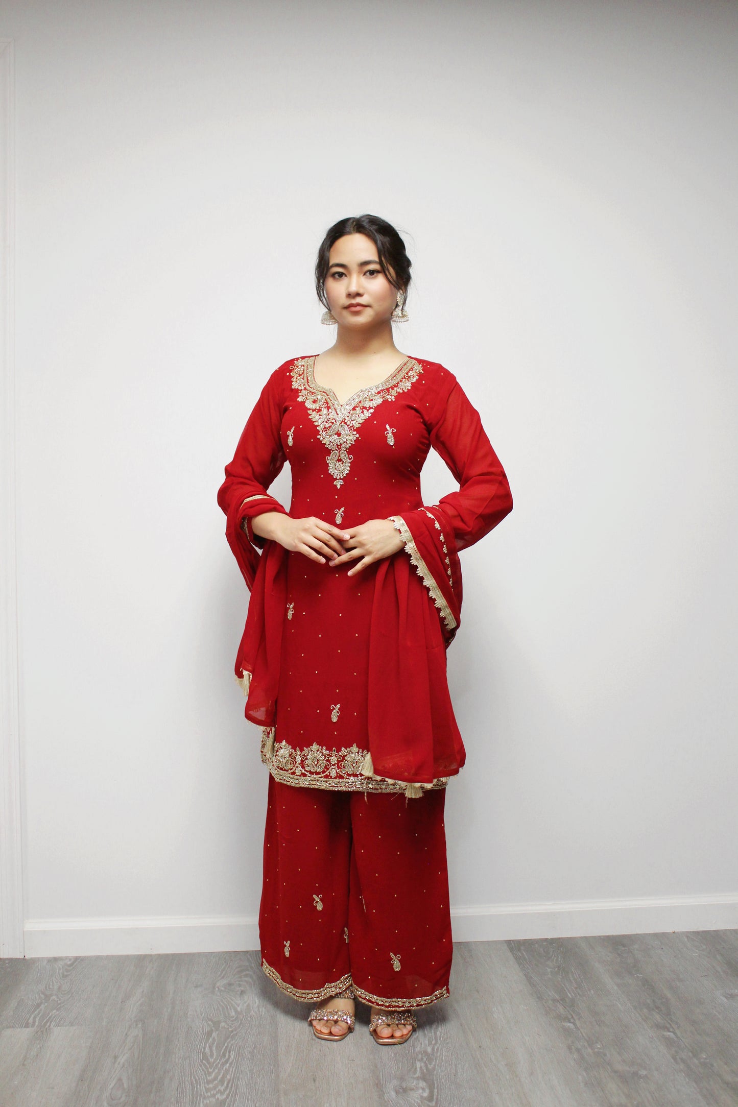 Hand-worked Palazzo Kurta set with Dupatta.
