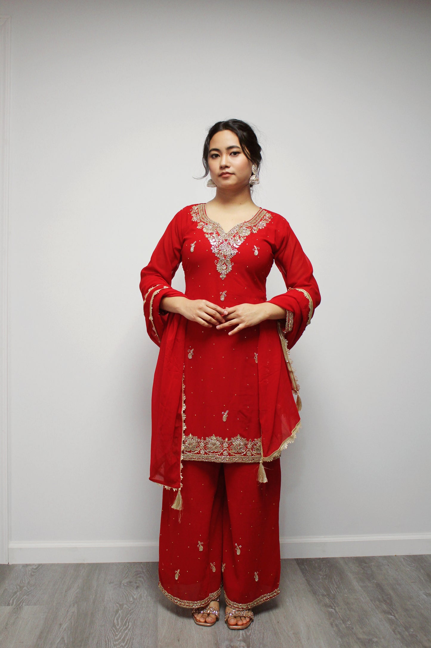 Hand-worked Palazzo Kurta set with Dupatta.